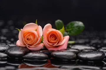 Foto op Plexiglas Still life with two orange rose and wet stones © Mee Ting