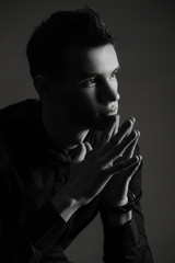 Fototapeta premium Elegant young handsome man. Studio fashion portrait.