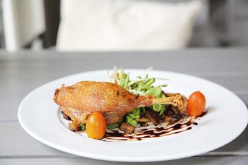 Duck confit , Roasted duck with blueberry sauce