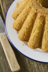 freshly baked cake on wooden surface