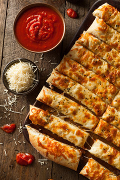 Homemade Cheesy Breadsticks With Marinara