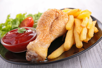 chicken leg and french fries