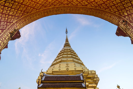 Thai art door arch in Wat Phra That Doi Suthep background with g
