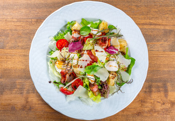 Salad with fried bacon