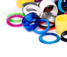 Pile of round modern colorful plastic bangles