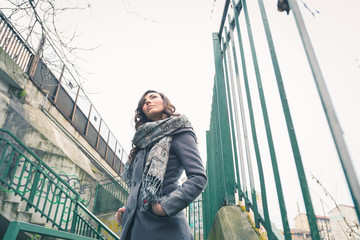 Beautiful girl posing in an urban context