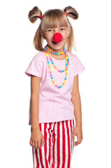 Little girl with clown nose