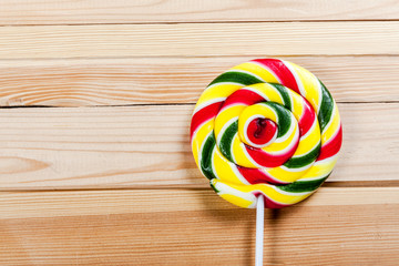 Lollipop on wood.
