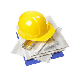 yellow helmet , pvc panels, metal profile on ceiling, isolated