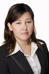 beautiful businesswoman standing against white background