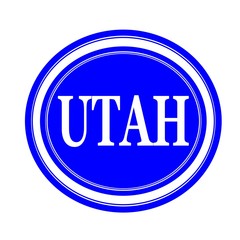 Utah white stamp text on blue