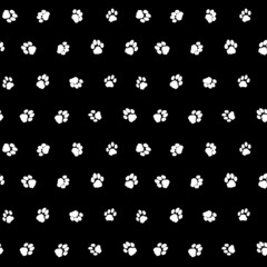 Contrast black and white seamless pattern with cat footprints.