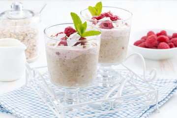 dessert with oatmeal, whipped cream and raspberries
