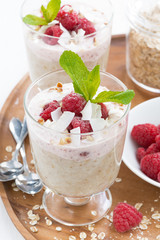 healthy dessert with oatmeal, whipped cream and raspberries