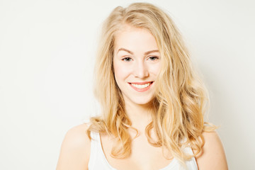 Naklejka premium Smiling Blonde Woman. Makeup and Curly Hairstyle