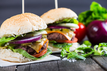 traditional pub style burger  on wooden table