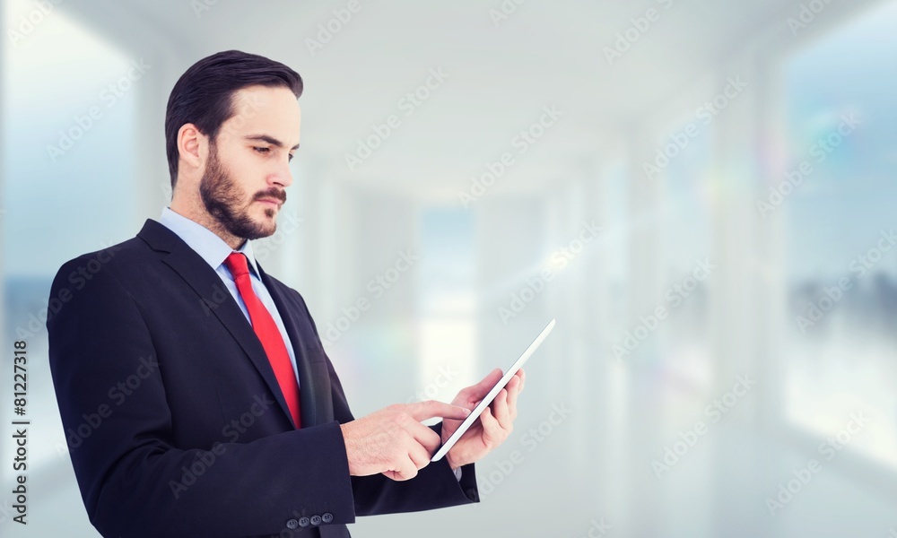 Poster composite image of businessman scrolling on his digital tablet
