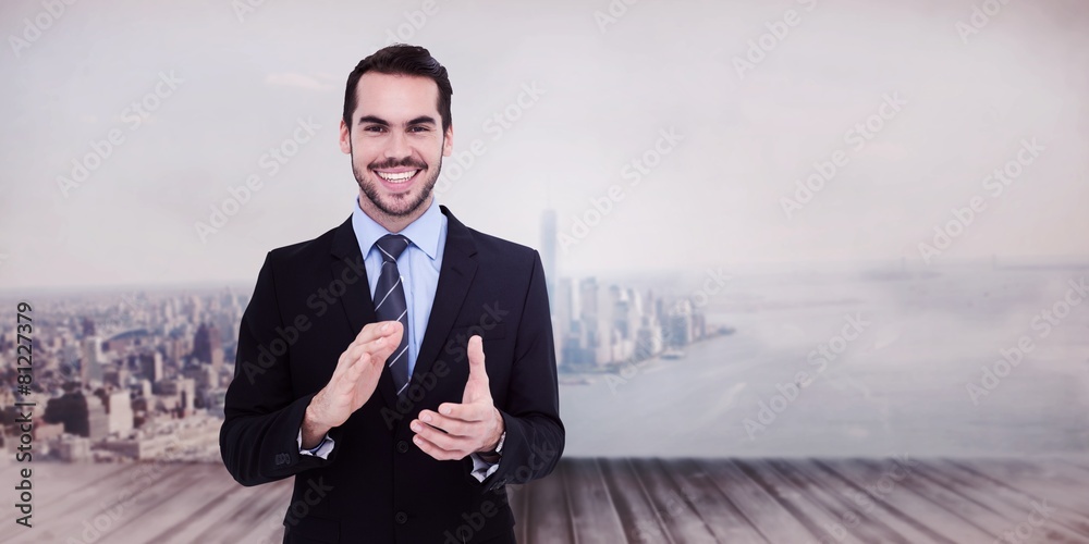 Poster composite image of happy businessman standing and applauding