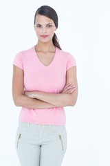 Serious woman looking at camera with arms crossed