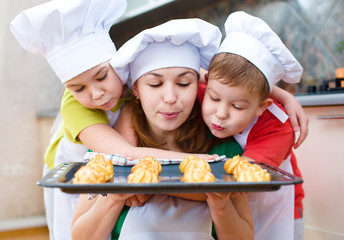 Mother with children making bread