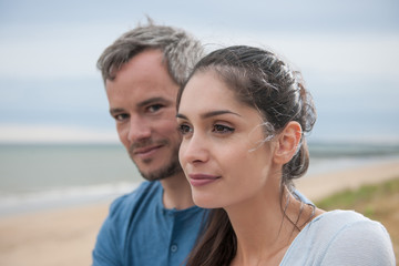 Fototapeta premium Portrait of a beautiful couple at the beach