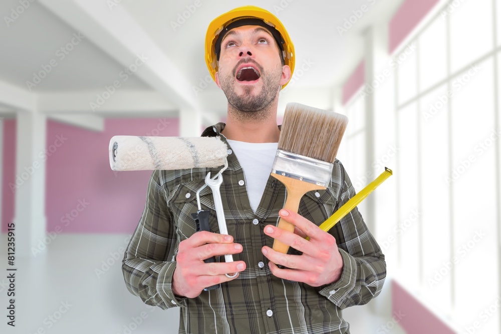 Aufkleber composite image of screaming manual worker holding various tools