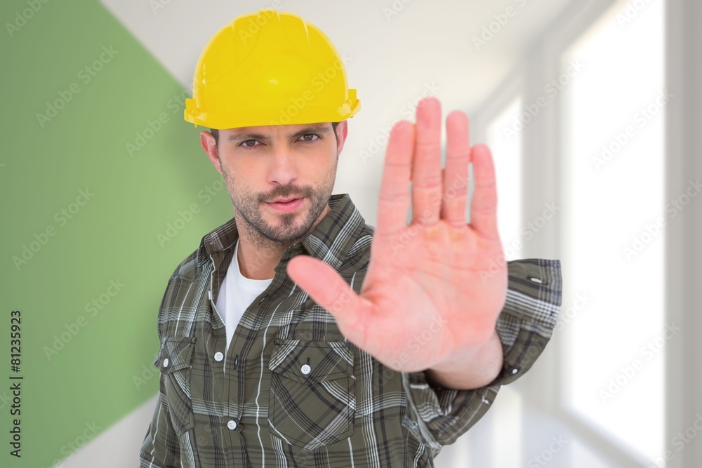 Poster composite image of confident manual worker gesturing stop sign