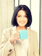 lovely businesswoman with mug