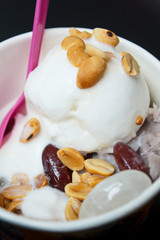 Coconut ice cream in a cup.