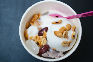 Coconut ice cream in a cup.