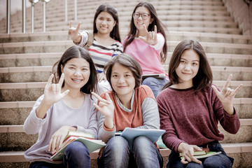 Fototapeta premium group of happy teen high school students outdoors