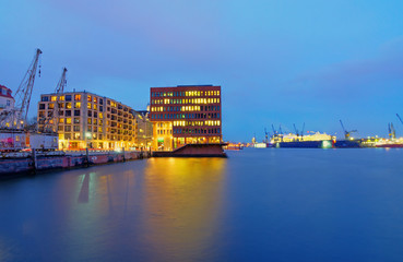 Docks and office buildings at the river Elbe in Hamburg, Germany