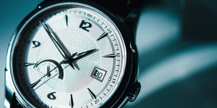 Luxury watch isolated on a pleasant blue background
