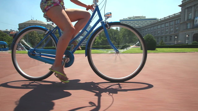 young blond woman cycling