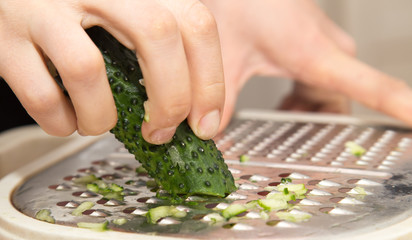 sliced cucumber on a grater