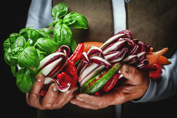 fruits and vegetables in hands