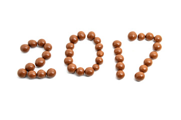  image 2017 of sweet chocolate round on a white background.