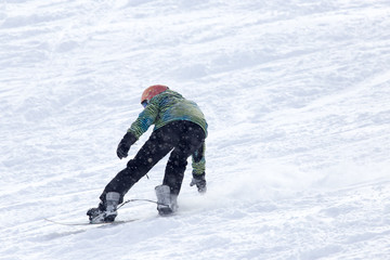 Fototapeta na wymiar snowboarder snowboarding