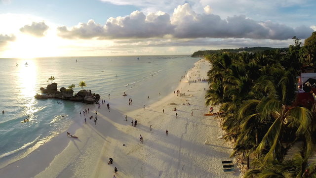  Aerial flight above white beach and Willy's Rock at Boracay Bea