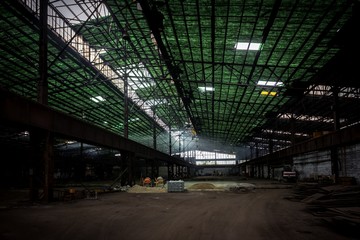 Large empty hall with concrete walls