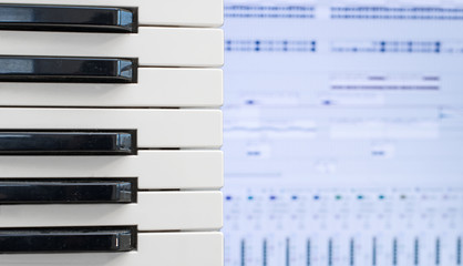 Piano keys over recording software background.