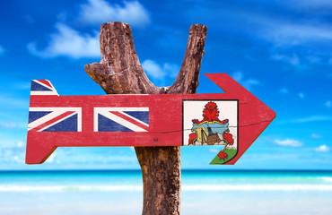 Bermuda Flag wooden sign with beach background