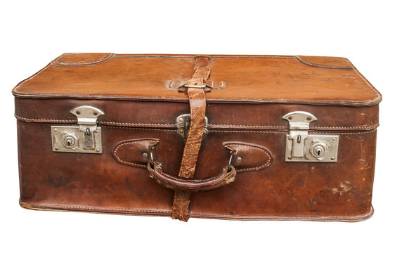 Old retro leather suitcase on white background