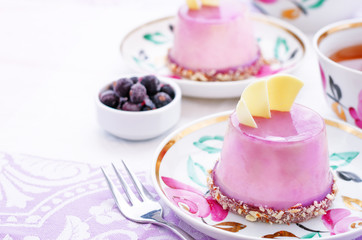 cake with a creamy mousse and stuffed berry mousse