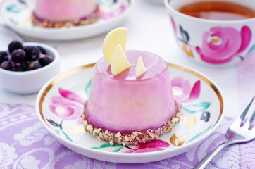 cake with a creamy mousse and stuffed berry mousse