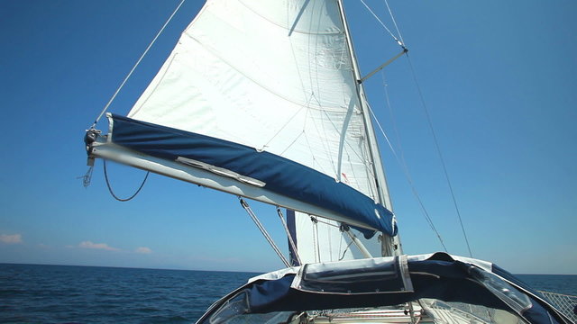 Sail floating in the wind on a beautiful sailboat