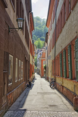 Narrow sunny street in Heidelberg