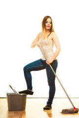 Young cleaning woman with mop and bucket