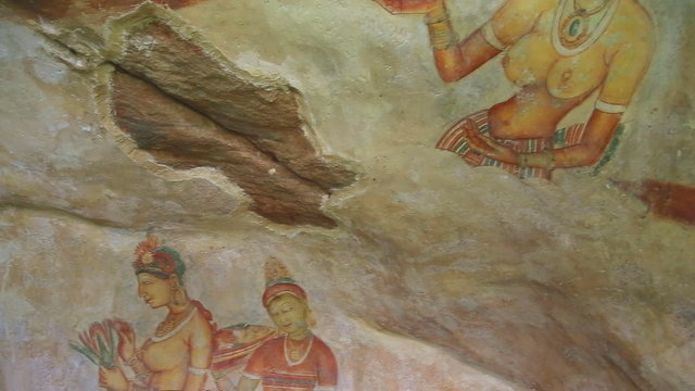 SIGIRIYA, SRI LANKA - FEBRUARY 2014: Wall drawing Frescos in Sigiriya, an ancient palace located in the central Matale District.