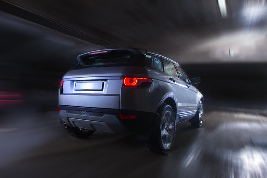 Fototapeta SUV moving in the tunnel